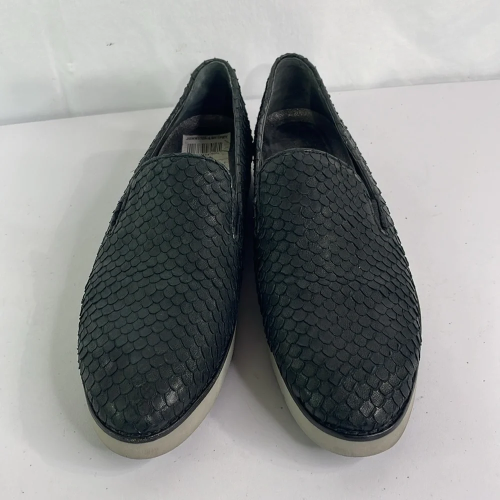 Johnston and Murphy, 781-1545. Texturized black leather loafers with gray soles.
